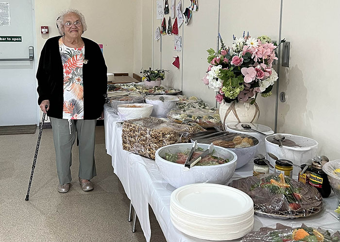 Keeshond Club President view the lovely food ready for lunch.